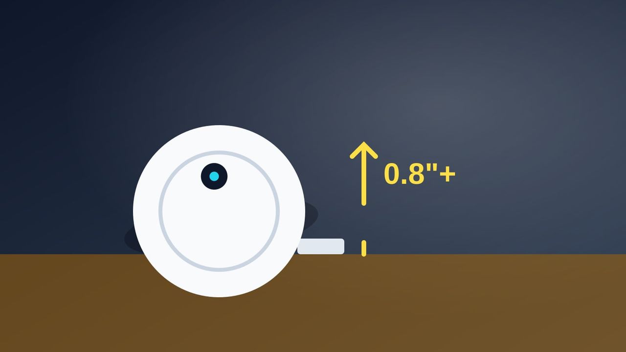 Illustration of a robot vacuum about to climb over a door threshold